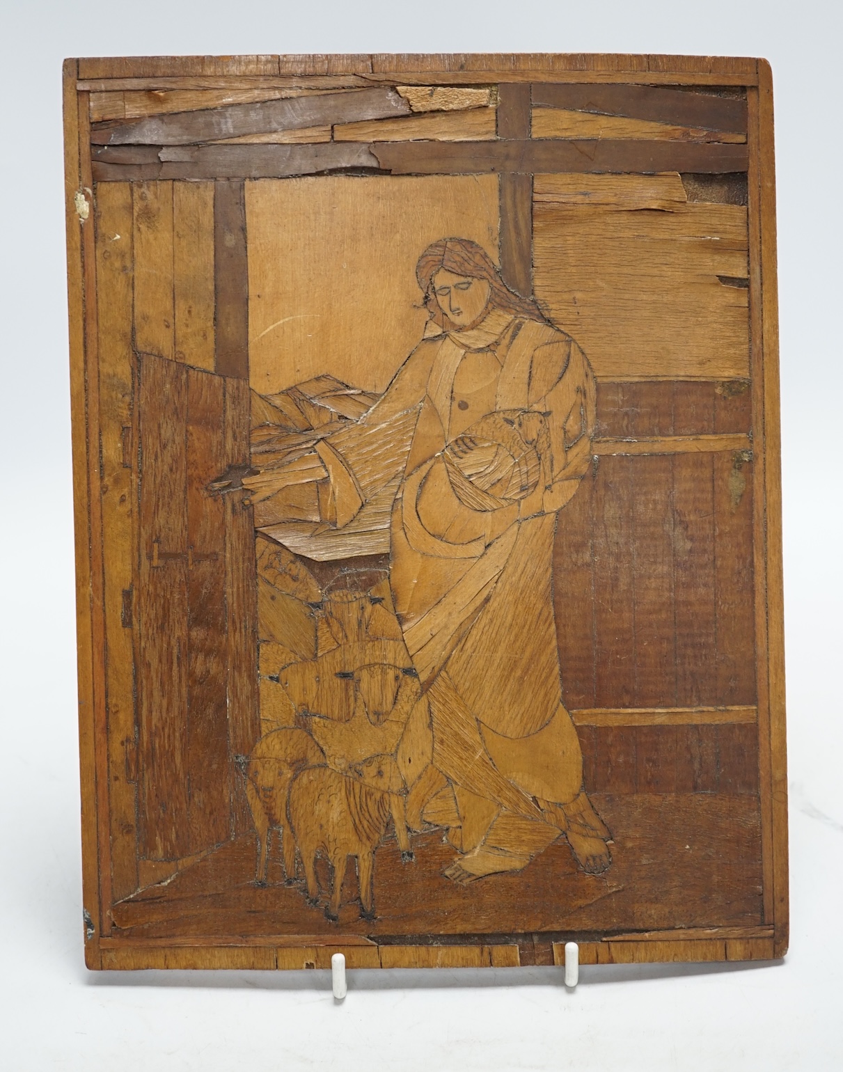 From the Studio of Fred Cuming. An Italian inlaid marquetry panel depicting a shepherd and flock of sheep, 27 x 21cm. Condition - poor